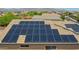Angled roof top view of installed solar panels for energy saving in this home at 1932 S 220Th Dr, Buckeye, AZ 85326