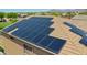 Rooftop view of solar panels installed on this home for energy savings at 1932 S 220Th Dr, Buckeye, AZ 85326