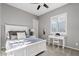 Bright bedroom with a large window, neutral walls, carpet and stylish decor at 19748 E Walnut Rd, Queen Creek, AZ 85142