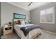 Calming bedroom features light gray walls, plush carpet, and a large window with shutters at 19748 E Walnut Rd, Queen Creek, AZ 85142