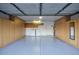 Spacious garage with ample storage cabinets and epoxy floors at 19906 N 76Th Ave, Glendale, AZ 85308