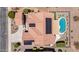 Overhead aerial image showcasing the property's pool, solar panels, and unique desert landscaping design at 20655 N 273Rd Ave, Buckeye, AZ 85396