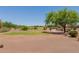 Scenic view of the golf course and community with open green space at 20655 N 273Rd Ave, Buckeye, AZ 85396