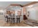 Eat-in kitchen area complete with barstool seating and travertine flooring at 20655 N 273Rd Ave, Buckeye, AZ 85396