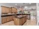Spacious kitchen with ample cabinetry, island, and stainless steel appliances for modern living at 20655 N 273Rd Ave, Buckeye, AZ 85396