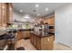 Beautiful kitchen featuring granite countertops, an island, and stainless steel appliances at 20655 N 273Rd Ave, Buckeye, AZ 85396