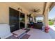 Spacious covered patio with sliding doors, offering a seamless transition from indoor to outdoor living and entertaining spaces at 20655 N 273Rd Ave, Buckeye, AZ 85396