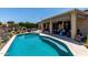 Beautiful swimming pool with ample space for water activities, steps and a covered patio at 20655 N 273Rd Ave, Buckeye, AZ 85396