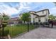 Large backyard with a lush lawn, fenced perimeter, brick patio, and built-in BBQ area at 20689 W Valley View Dr, Buckeye, AZ 85396