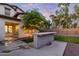 Stunning backyard with outdoor kitchen, offering serene outdoor space at 20689 W Valley View Dr, Buckeye, AZ 85396