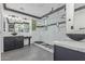 Bathroom features a walk-in shower, double vanity, and designer fixtures at 20689 W Valley View Dr, Buckeye, AZ 85396