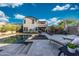 Stunning backyard oasis featuring a beautiful pool, spa, and lounge area, perfect for entertaining at 21194 W Hillcrest Blvd, Buckeye, AZ 85396