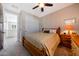Cozy bedroom features carpet, ceiling fan, with access to private balcony at 21194 W Hillcrest Blvd, Buckeye, AZ 85396