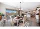 Open floor plan showcasing dining room with patio access, connecting to the kitchen and living spaces at 21194 W Hillcrest Blvd, Buckeye, AZ 85396