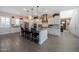 Stylish kitchen with a large island, stainless steel appliances, and ample counter space at 21194 W Hillcrest Blvd, Buckeye, AZ 85396