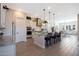 Spacious kitchen featuring an island with bar seating, stainless appliances, and tile flooring at 21194 W Hillcrest Blvd, Buckeye, AZ 85396