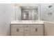 Modern bathroom with dual sinks, sleek countertops, and contemporary fixtures, offering a stylish and functional space at 21228 N 58Th St, Phoenix, AZ 85054