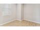 Neutral bedroom with tile flooring, bright natural light, and multiple electric outlets for convenience at 21228 N 58Th St, Phoenix, AZ 85054