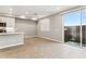 Bright living space featuring tile flooring, a sliding glass door to the backyard, and a view of the yard at 21228 N 58Th St, Phoenix, AZ 85054