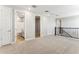 Bright and airy loft space featuring neutral carpet, fresh paint, and an open layout perfect for flexible living at 21228 N 58Th St, Phoenix, AZ 85054