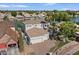 Aerial view of waterfront home showcasing the architecture, landscaping, and lake access at 2135 E Clipper Ln, Gilbert, AZ 85234