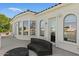 Open-air balcony with outdoor seating overlooking a scenic lakeside community offering relaxing waterfront views at 2135 E Clipper Ln, Gilbert, AZ 85234
