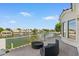 Open balcony with comfortable seating overlooking a scenic lake community providing a relaxing outdoor experience at 2135 E Clipper Ln, Gilbert, AZ 85234