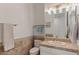 Updated half bathroom with a large vanity and updated faucet at 2135 E Clipper Ln, Gilbert, AZ 85234