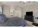 Spacious bedroom with en suite bathroom and walk in closet at 2135 E Clipper Ln, Gilbert, AZ 85234