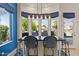 Eat in kitchen with view of the lake, blue accents and bright natural light at 2135 E Clipper Ln, Gilbert, AZ 85234