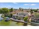 Exterior view of waterfront home with a hot tub and boat at 2135 E Clipper Ln, Gilbert, AZ 85234