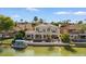 Waterfront home featuring a large patio, boat dock, and beautiful views at 2135 E Clipper Ln, Gilbert, AZ 85234