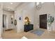 Elegant foyer with high ceilings, grand chandelier, and custom design details at 2135 E Clipper Ln, Gilbert, AZ 85234