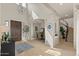 Grand two-story foyer with hardwood floors, curved staircase and ample natural light at 2135 E Clipper Ln, Gilbert, AZ 85234