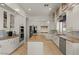 Well-lit kitchen featuring granite countertops, a kitchen island, and stainless steel appliances at 2135 E Clipper Ln, Gilbert, AZ 85234