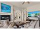 Spacious living room with an updated fireplace and high ceilings at 2135 E Clipper Ln, Gilbert, AZ 85234