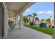 Covered patio with outdoor seating and lake views at 2135 E Clipper Ln, Gilbert, AZ 85234