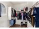 Walk-in closet with built-in shelving and ample storage for clothes and accessories at 21605 S 187Th Way, Queen Creek, AZ 85142