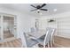 Dining area featuring a marble table, modern lighting, and built in shelving at 2425 W Shady Glen Ave, Phoenix, AZ 85023