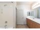 Bright bathroom featuring a tub, shower, vanity, and tile flooring at 295 N Rural Rd # 143, Chandler, AZ 85226