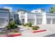 Charming two-story home with beautiful landscaping and convenient attached garages in a clean community at 295 N Rural Rd # 143, Chandler, AZ 85226