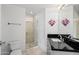 Bright bathroom with a glass-enclosed shower, and modern fixtures at 310 S 4Th St # 601, Phoenix, AZ 85004