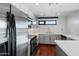 Contemporary kitchen showcasing stainless steel appliances and white countertops at 310 S 4Th St # 601, Phoenix, AZ 85004