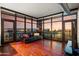 Open living room featuring hardwood floors, floor to ceiling windows, and beautiful city views at 310 S 4Th St # 601, Phoenix, AZ 85004