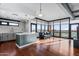 Open concept living space featuring kitchen island, hardwood floors, and natural light at 310 S 4Th St # 601, Phoenix, AZ 85004
