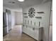 Dining area featuring modern decor, including floating shelves and a unique wall decoration at 3104 E Broadway Rd # 207, Mesa, AZ 85204