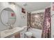 Cozy bathroom featuring a marble-tiled shower and modern fixtures at 3500 N Hayden Rd # 203, Scottsdale, AZ 85251