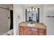 Renovated bathroom featuring granite counters and a shower at 3500 N Hayden Rd # 203, Scottsdale, AZ 85251