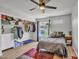 Spacious bedroom featuring a ceiling fan, closet, and natural light at 3500 N Hayden Rd # 203, Scottsdale, AZ 85251