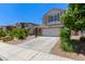 Charming two-story home with a two car garage and a spacious driveway at 3692 N 292Nd Dr, Buckeye, AZ 85396